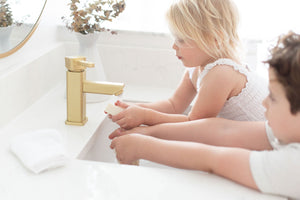 kids washing hands at sink with all natural olive oil soap