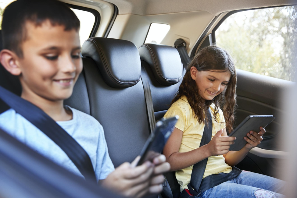 Kids in the car on a road trip