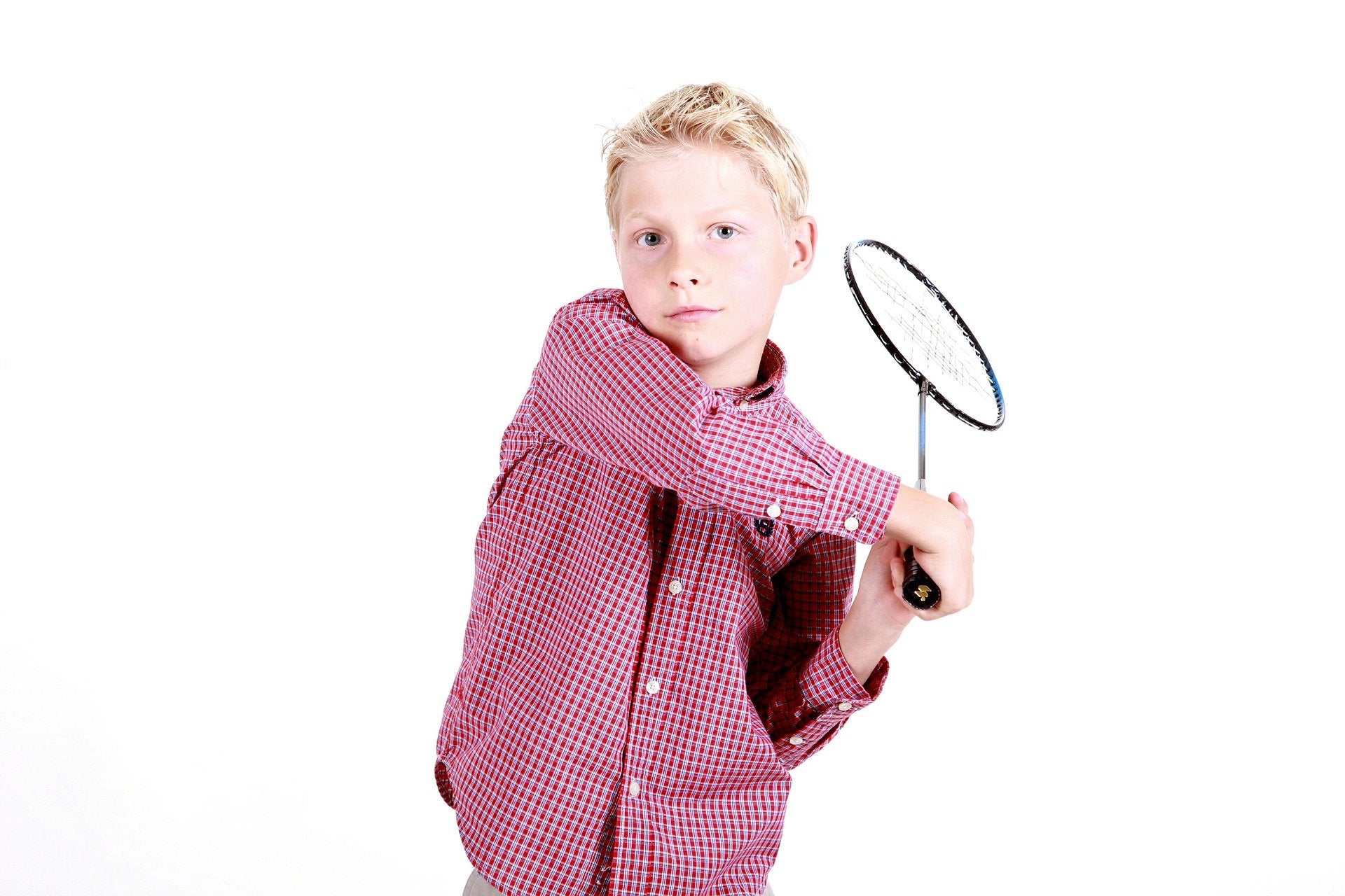 Boy holding a badminton racket