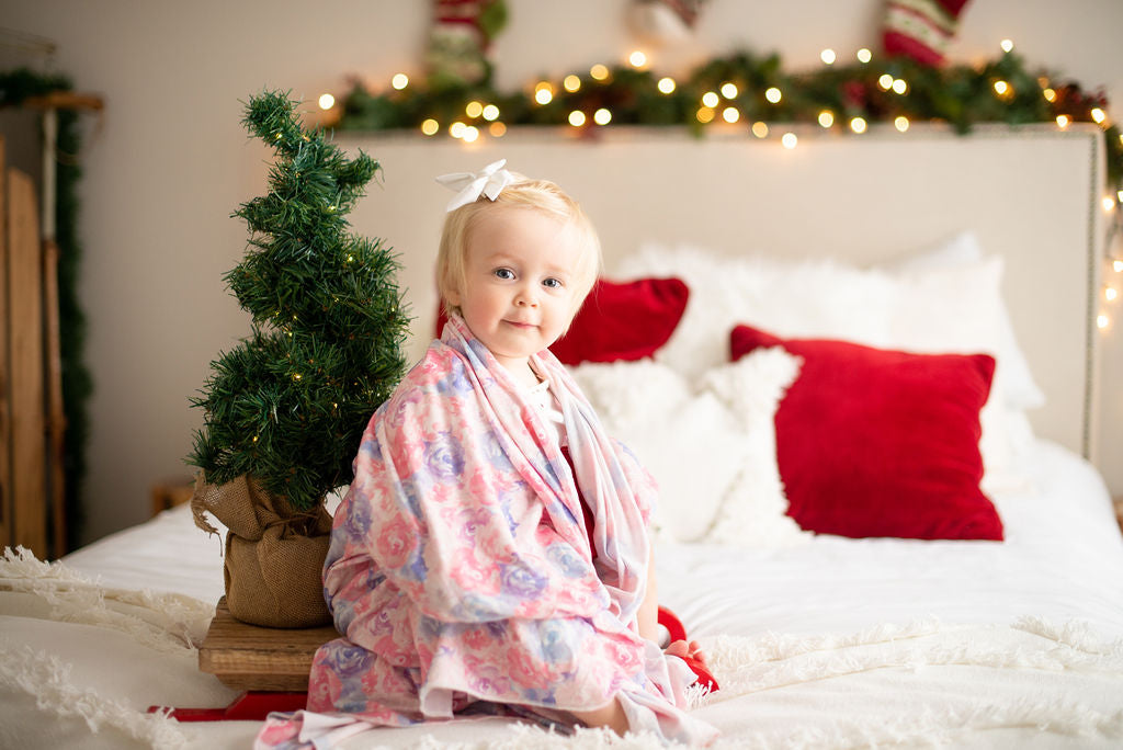 Baby in Memeeno swaddle blanket 