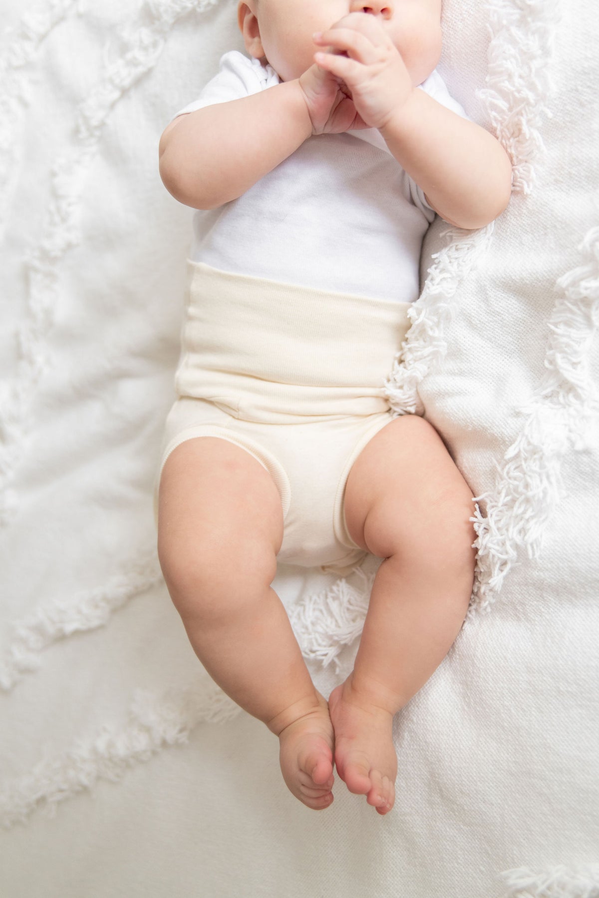 baby wearing naturelle unbleached cotton bloomer