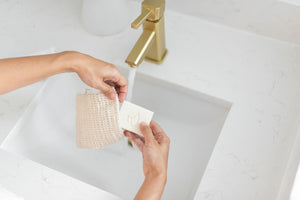 putting soap in sisal pouch