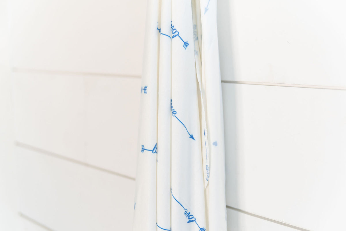 close up of love him swaddle